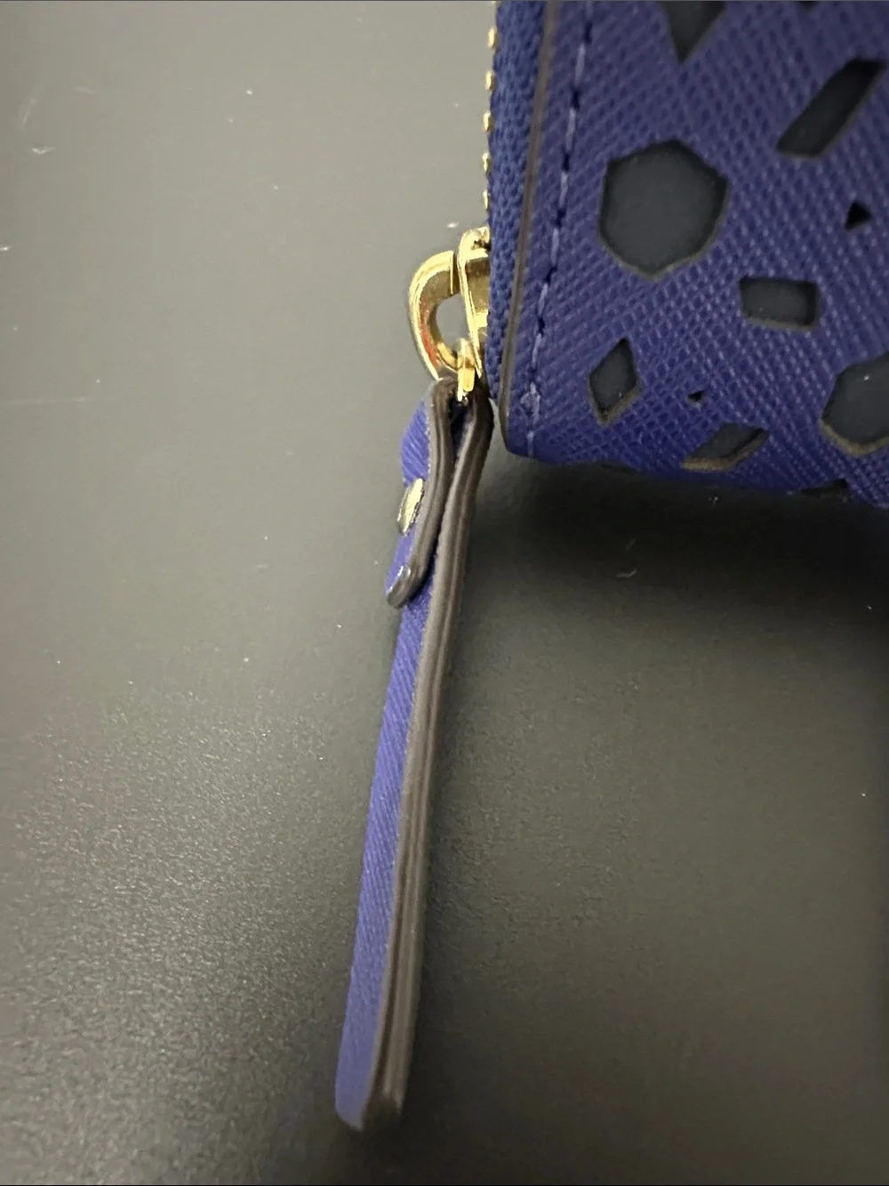 EUC kate spade cobalt blue laser-cut zip wallet with gold logo and Gold Zipper